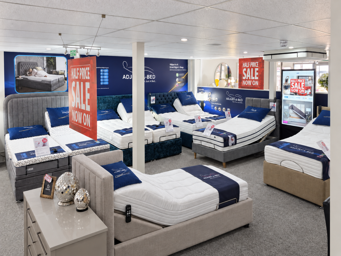 Adjustable bed display area at Devon Bed Centre showroom in Exeter